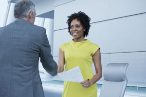 Business people shaking hands in meeting