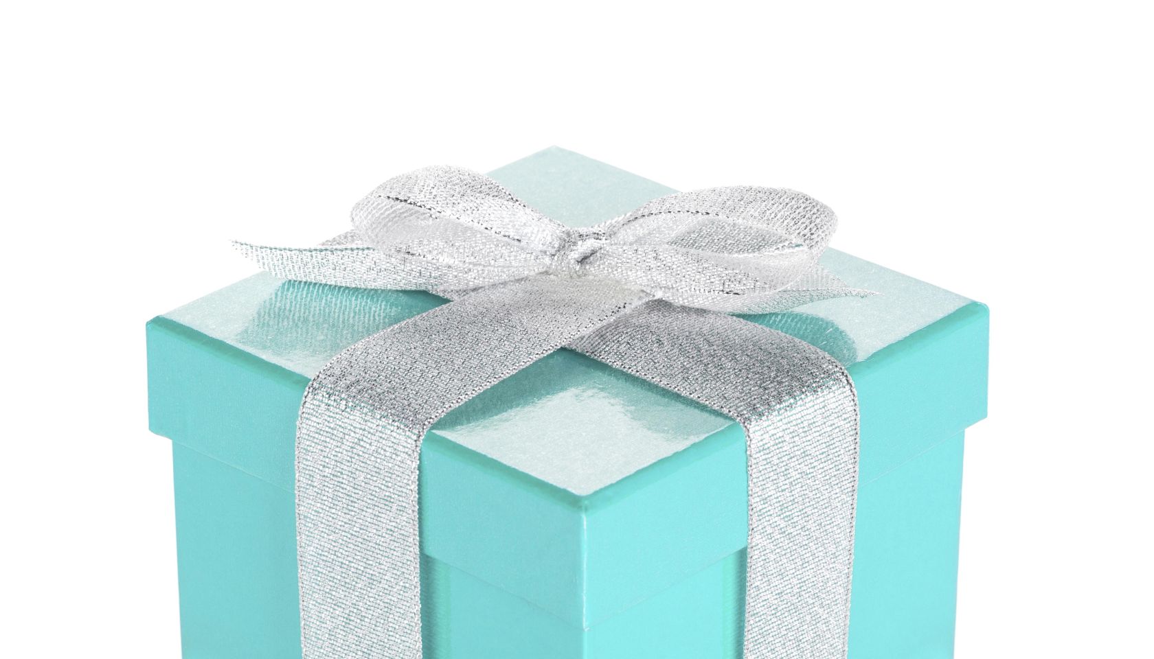 Blue gift box with silver ribbon and bow. Isolated on white background