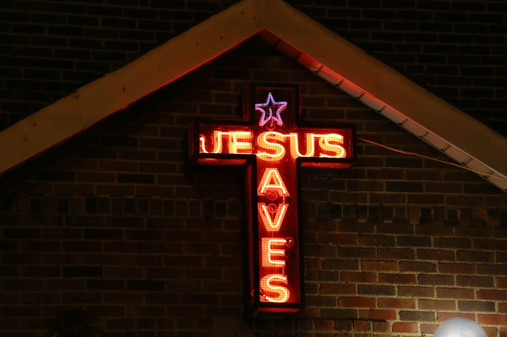 'Jesus Saves' Illuminated neon sign