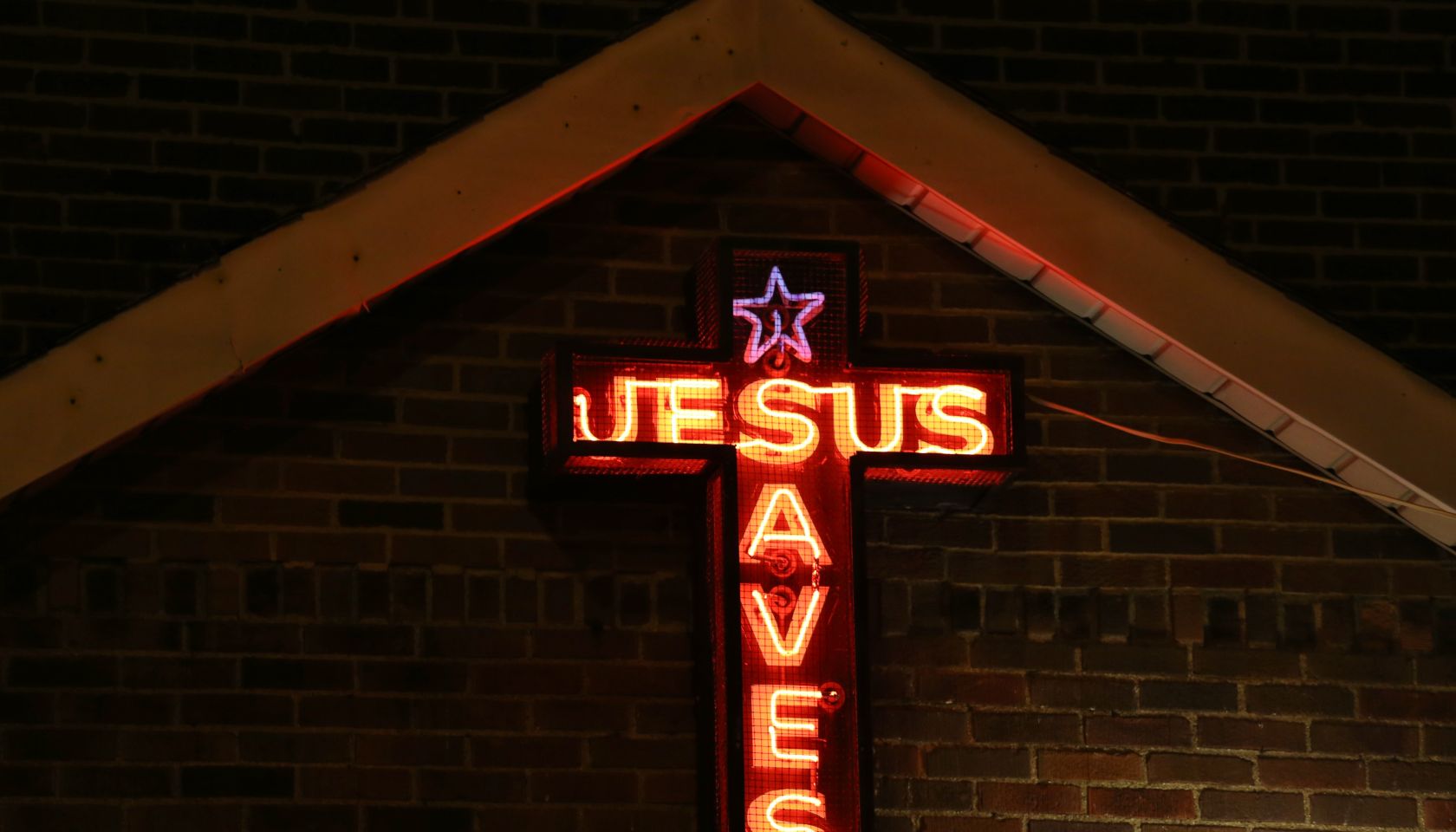 'Jesus Saves' Illuminated neon sign