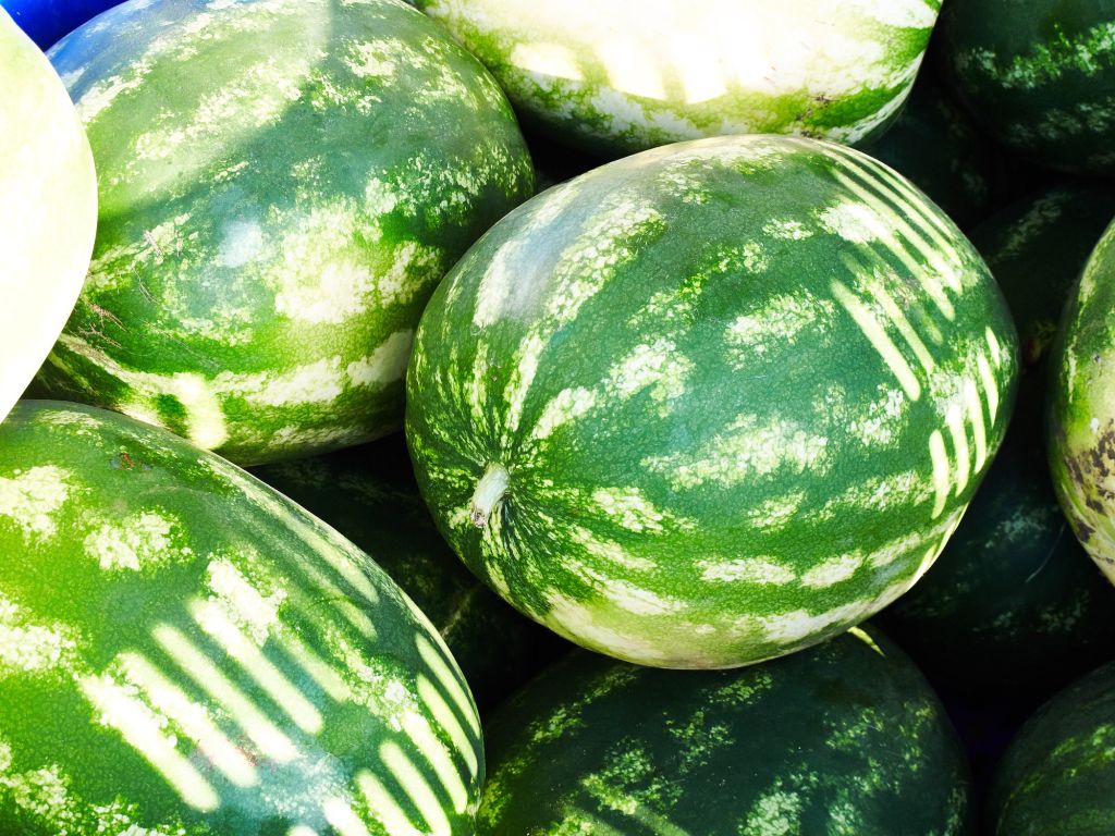 Close-Up Of Watermelons For Sale At Market