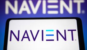 In this photo illustration, the Navient Corporation logo is...
