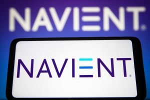 In this photo illustration, the Navient Corporation logo is...