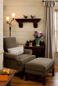 Vignette of chair and ottoman in guestroom