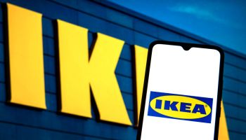 In this photo illustration the Ikea logo seen displayed on a...