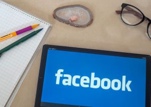 In this photo illustration, a Facebook logo seen displayed...