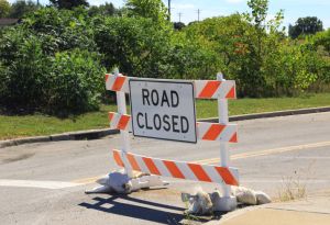 Road close sign and barricade