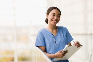 Female medical student smiles for camera before class