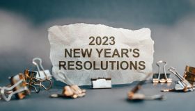 New year resolutions 2023 on desk. Goals, resolutions, plan, action, checklist concept. New Year 2023 background, copy space