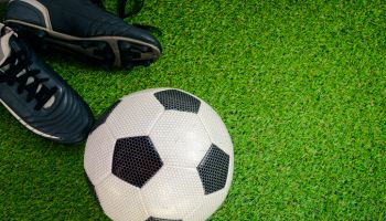 The Perfect Soccer Gear: Boots and Ball in Action