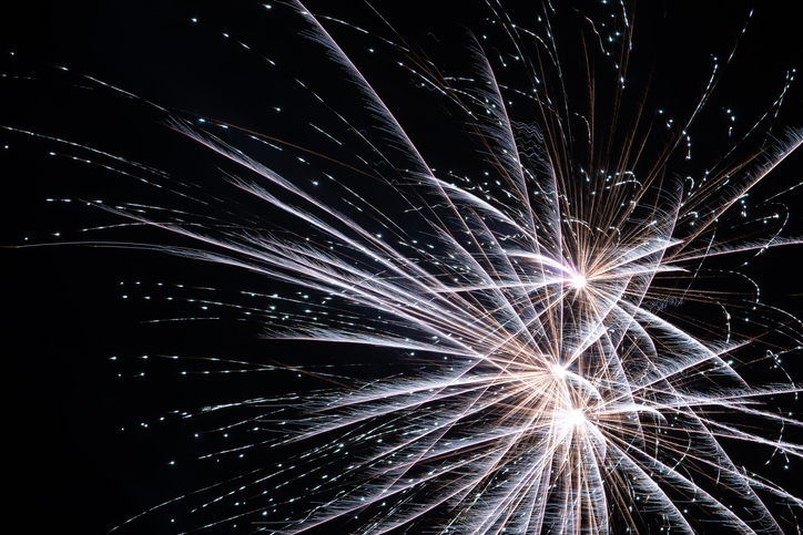 fireworks to welcome the new year, light flowers in the sky, holiday celebration, light painting