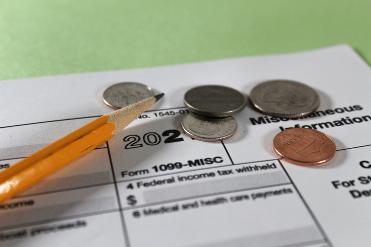 Tax forms tax season paperwork pencil and money