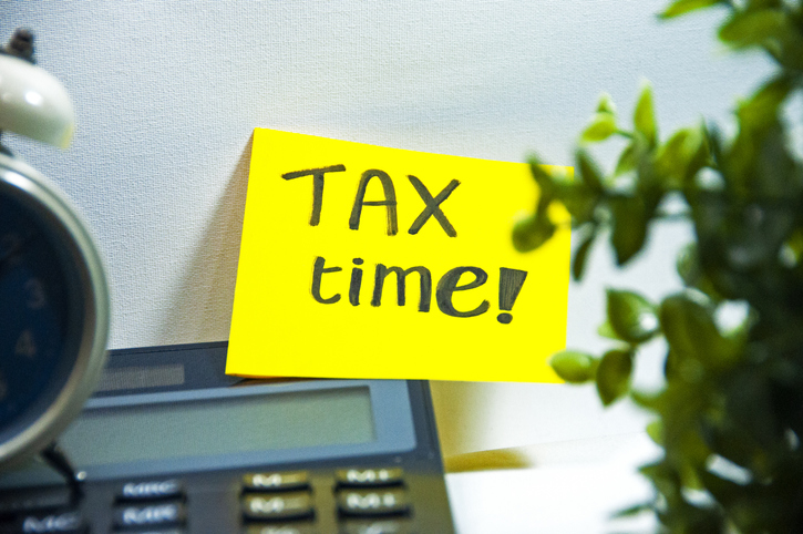 Business and individual reminder of preparing for tax return copy space stock photo
