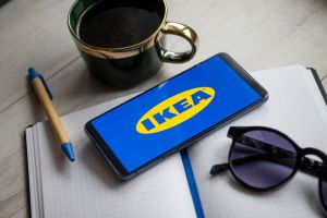 In this photo illustration a Ikea logo seen displayed on a...