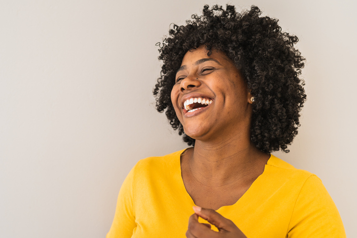 Portrait of a young woman laughing