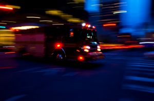 TORONTO FIRE TRUCK SPEEDING ON BAY STREET AT NIGHT