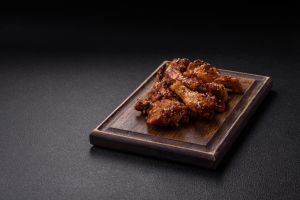 Delicious crispy baked chicken wings in teriyaki sauce