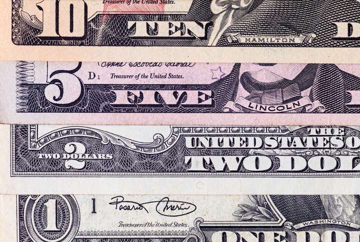 Paper money of the United States. Fragments of dollar bills.