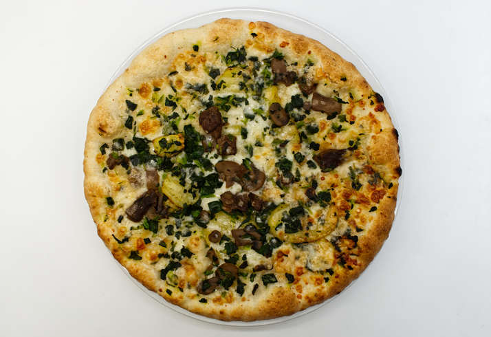 Italian Pizza with potatoes, mushrooms and spinach